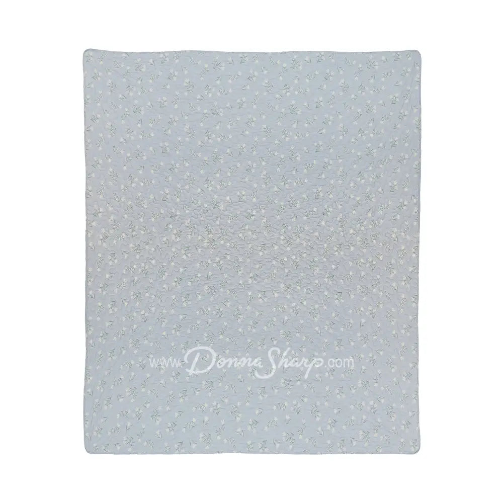 Donna Sharp Blue Pastures cotton throw blanket reverse side in soft blue with delicate cream floral sprigs