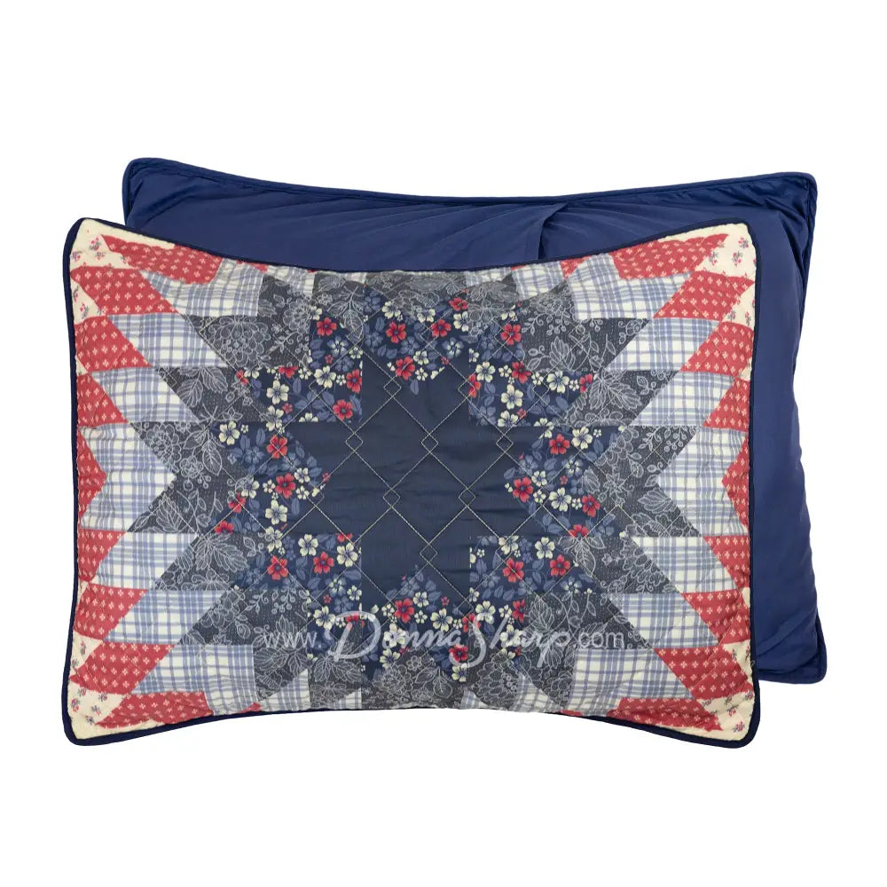 Donna Sharp Bluefield Star reversible pillow sham with navy floral, country blue, periwinkle, pale ivory, rose, and raspberry Lone Star pattern front and solid navy back with piping