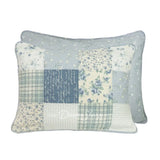 Donna Sharp Blue Pastures reversible cotton pillow shams showing patchwork front in blue, gray and cream with floral, plaid and script patterns, and blue floral back