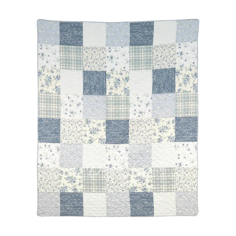 Donna Sharp Blue Pastures cotton patchwork throw blanket in soft blues, gentle creams, and crisp whites with floral, plaid, script and rose fabric blocks