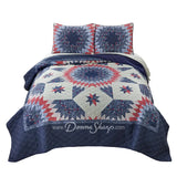 Donna Sharp Bluefield Star quilt set with navy floral border, country blue, periwinkle, pale ivory, rose, and raspberry Lone Star pattern, and matching pillow shams