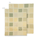 Donna Sharp Meadow cotton patchwork throw and lap blanket in soothing shades of sage green, beige, white, buttercream gold, and cream with floral fabric blocks